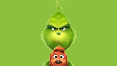 the Grinch and his dog on a green background
