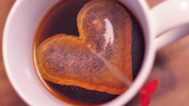 mug with a heart shaped tea bag