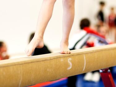 gymnast on a balance beam 