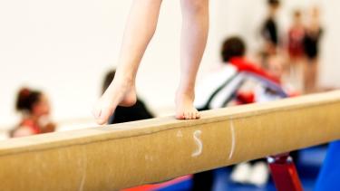 gymnast on a balance beam