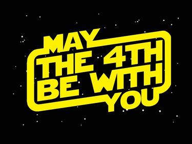 may the 4th be with you sign in yellow on a black background