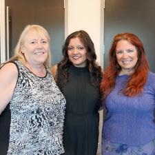 Photo of 3 females, two retirees and trustee Rupi Kanda-Rajwan